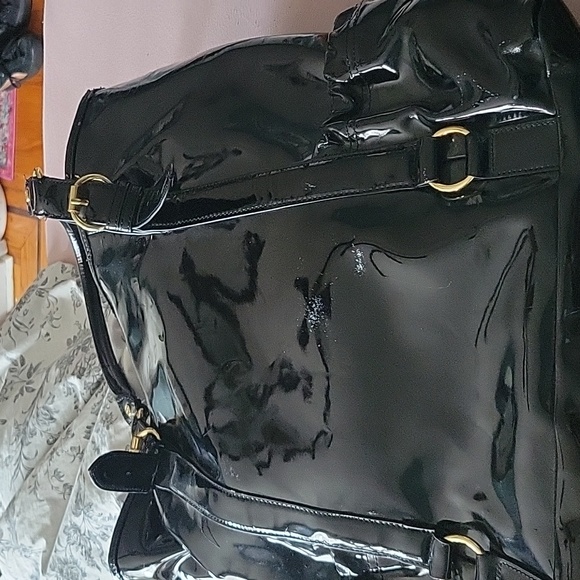 This is a Iman bag it has a few white marks on  it - Picture 2 of 2